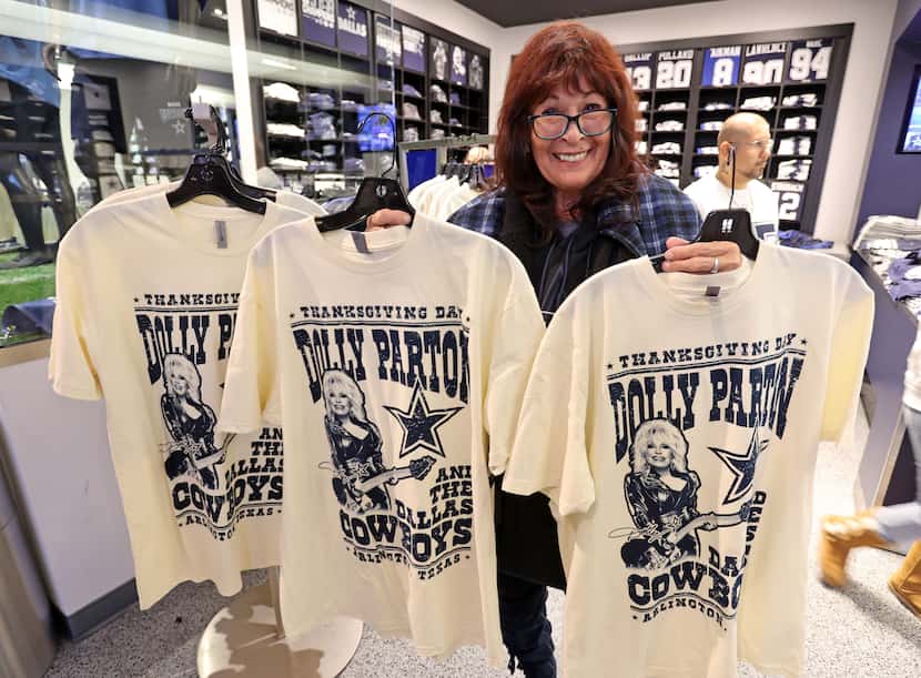 Silvia Rios-Saenz of Corpus Christi displays the Dolly Parton T-shirts she purchased at the...