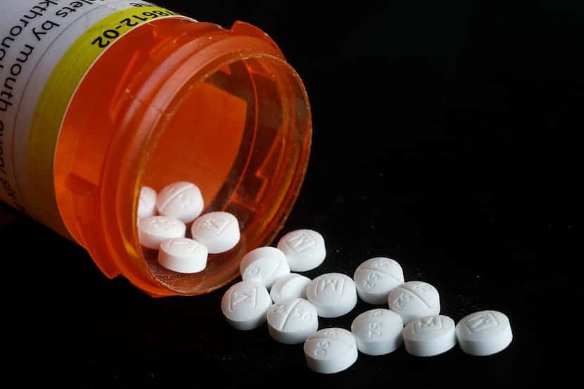 A Dallas-area doctor was convicted Monday of illegally prescribing powerful and highly...