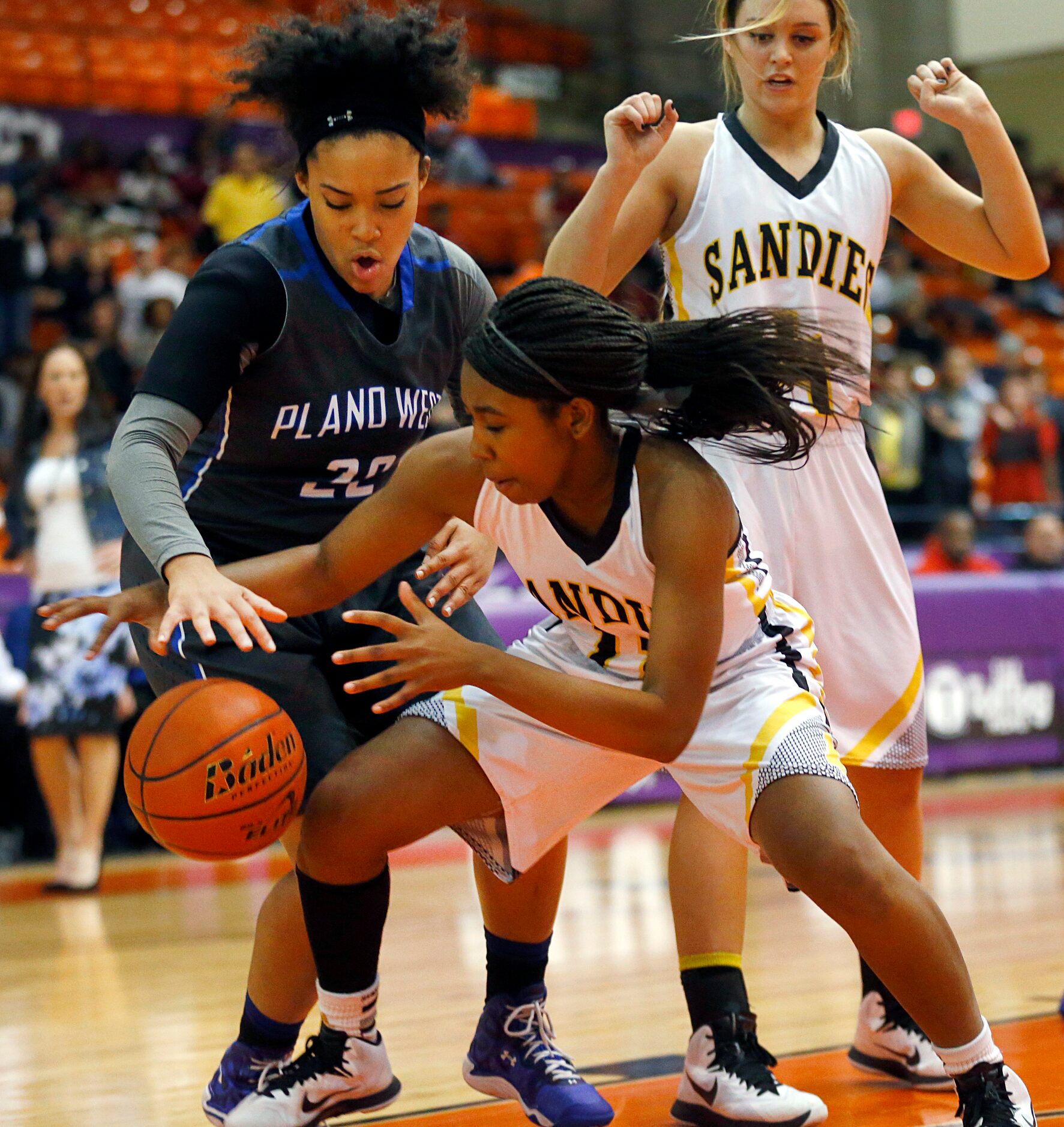 Plano West guard Jayln Hodge (22) and Amarillo wing Tara Samuel (11) scrap for a rebound in...