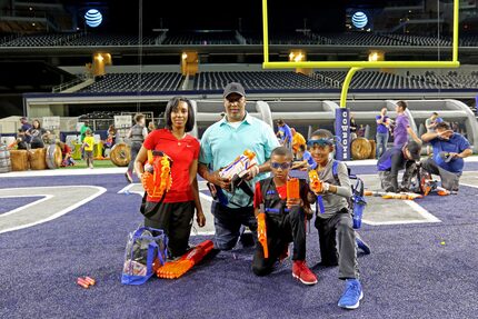 Chemene Pope, left, and her husband Joseph Pope brought their children Ryan Pope, right, and...