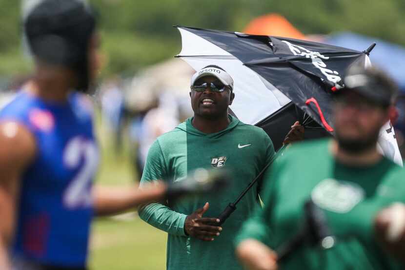 DeSoto coach Claude Mathis yells from the sidelines during the 2019 Texas 7on7 Championship...