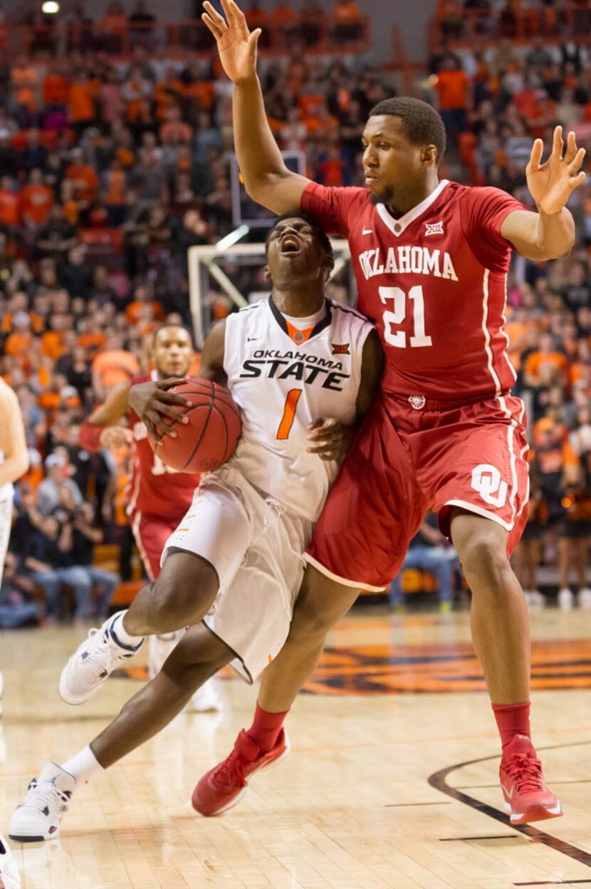 Jan 13, 2016; Stillwater, OK, USA; Oklahoma State Cowboys guard Jawun Evans (1) dribbles as...