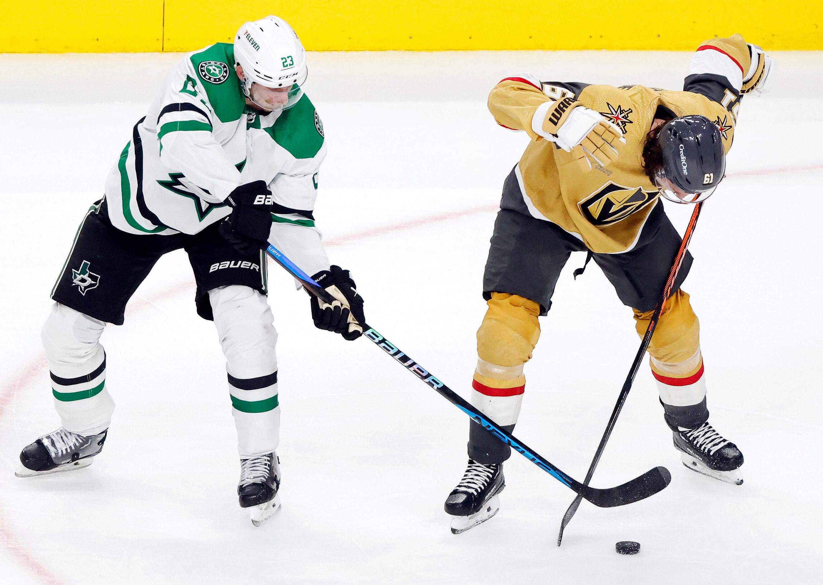 \Vegas Golden Knights right wing Mark Stone (61) reacts after getting a stick to the face...