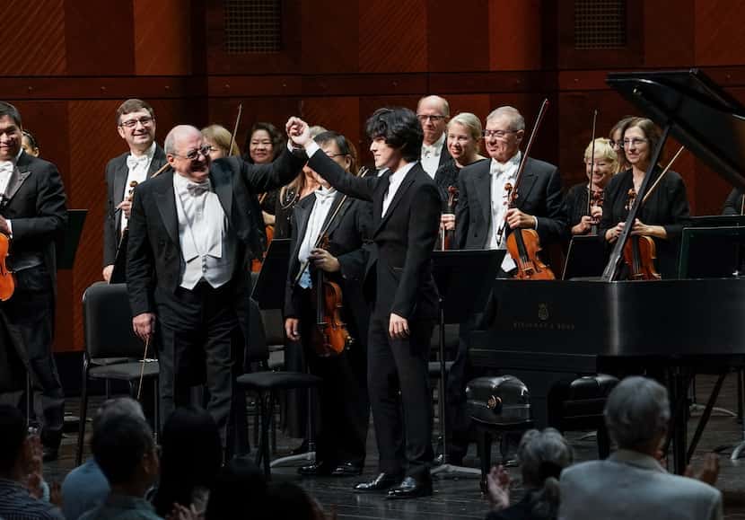 Pianist Yunchan Lim and music director Robert Spano acknowledged applause at a Fort Worth...