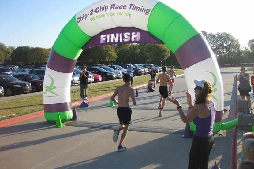 Runners cross the finish line at Running Over Depression, the 5K that Bradley Davis planned...