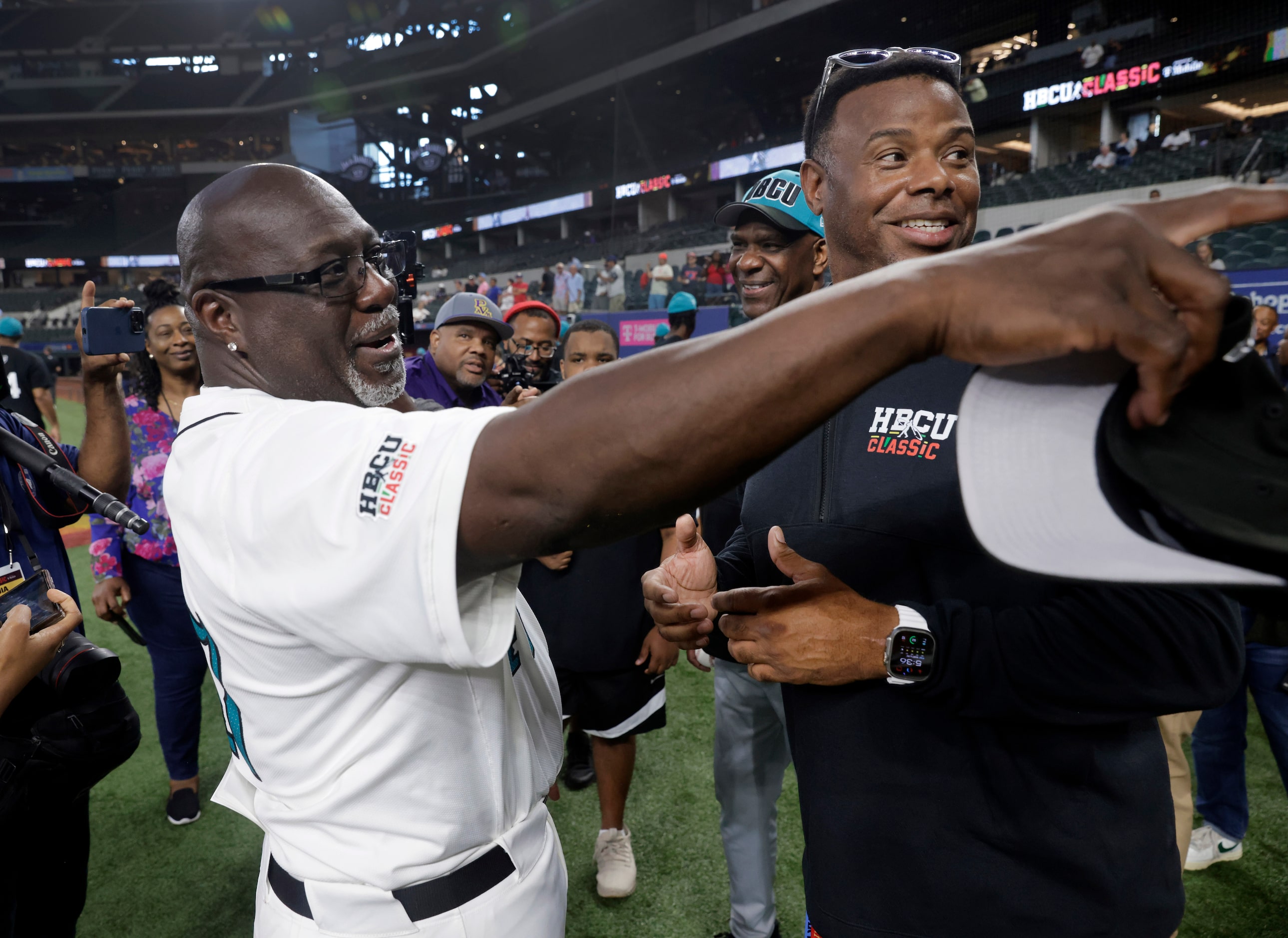 Former Texas Rangers infielder Mark McLemore (left) and former Seattle Mariner Ken Griffey...