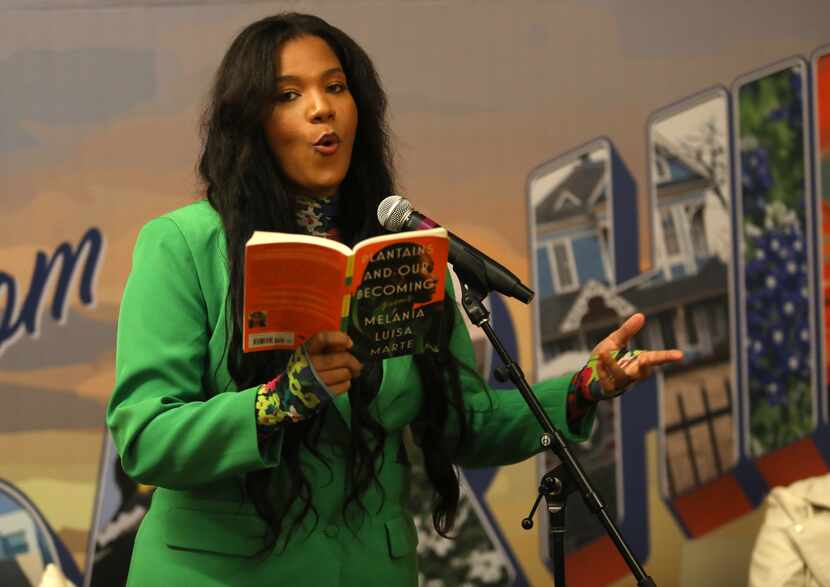 Melania Luisa Marte reads from her book during the event.  