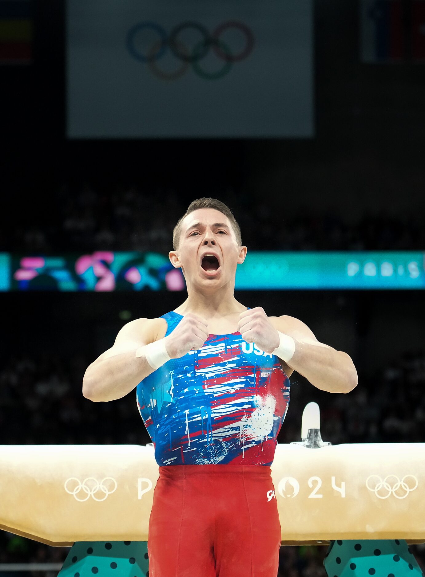 Paul Juda of the United States reacts after competing on the pommel horse during men’s...