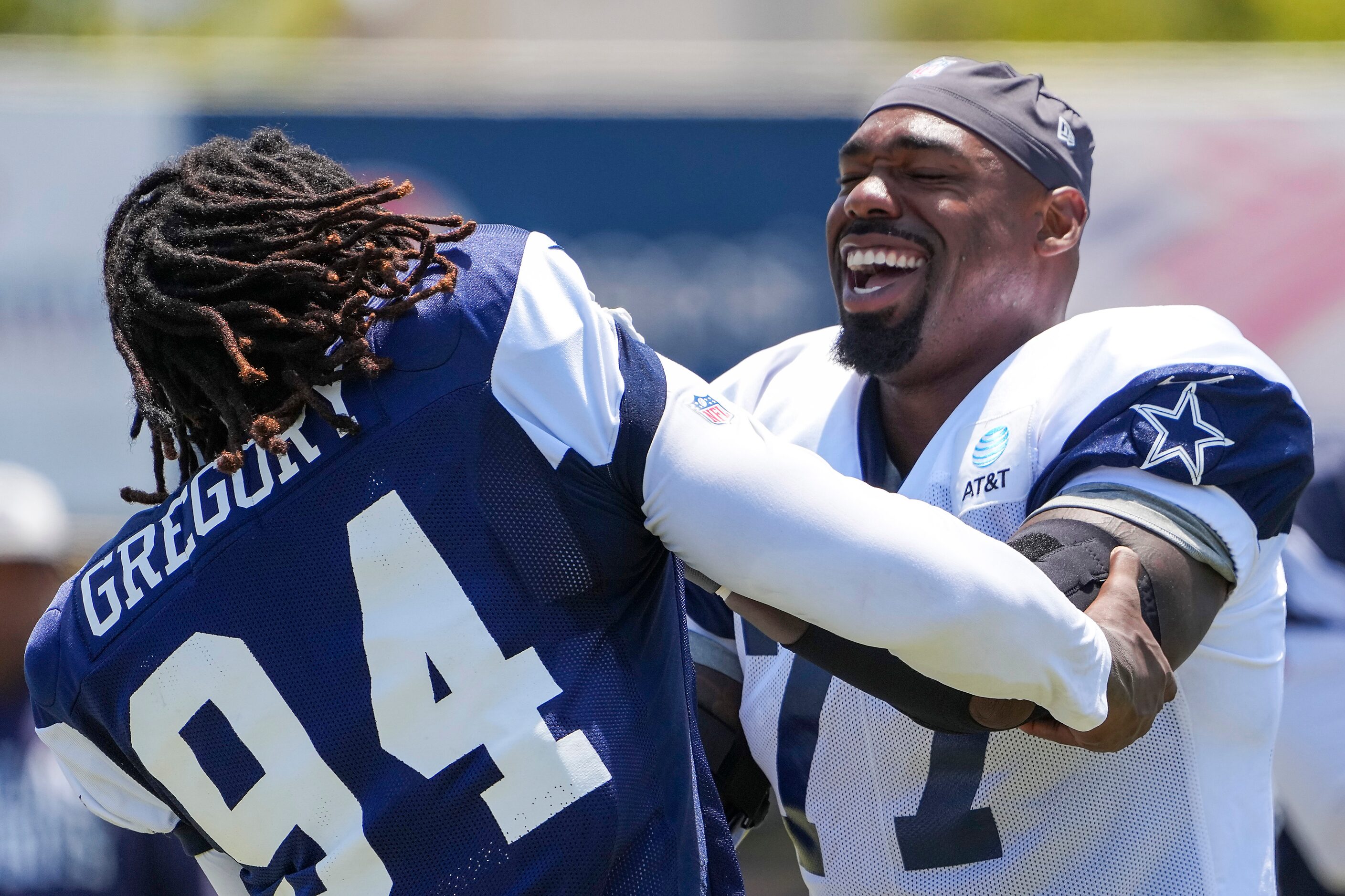 Dallas Cowboys defensive end Randy Gregory (94) works against tackle Tyron Smith (77) during...