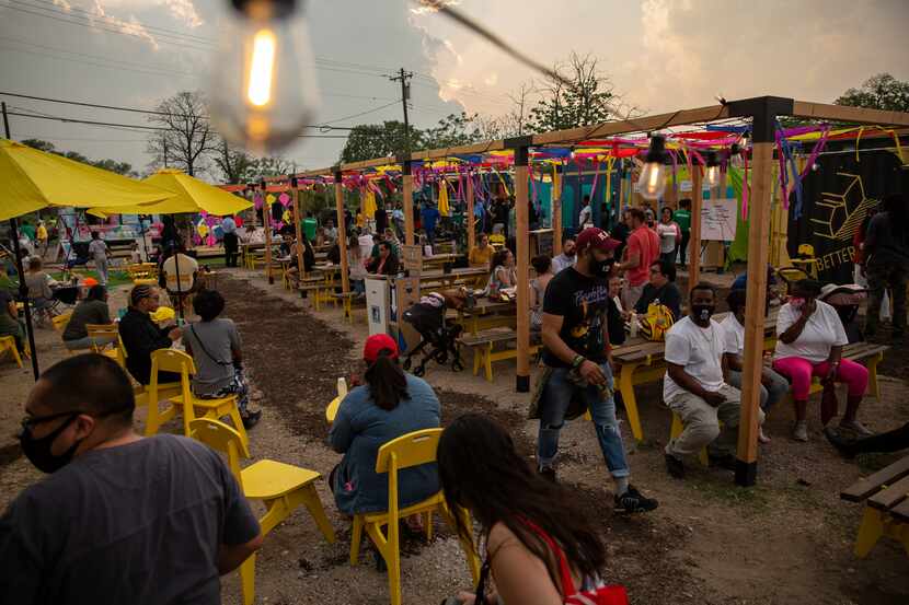 People enjoy the variety of food, live music, community gardens, and play area for the kids...