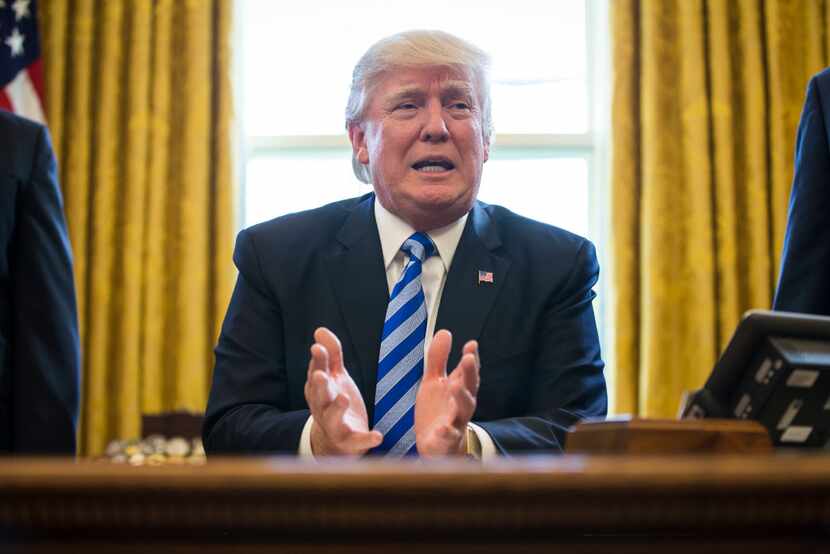 President Donald Trump speaks about the House pulling its planned legislation to repeal the...