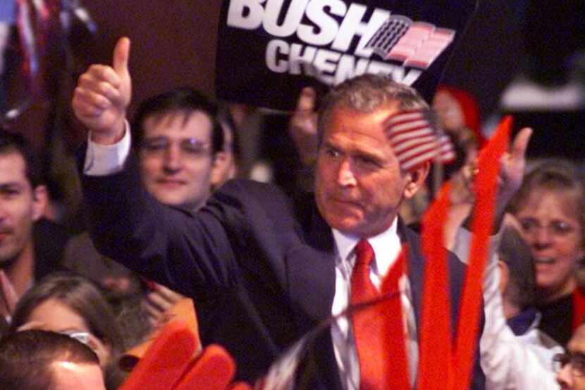 Then-Gov. George W. Bush arrives at a welcome rally at Austin-Bergstrom International...