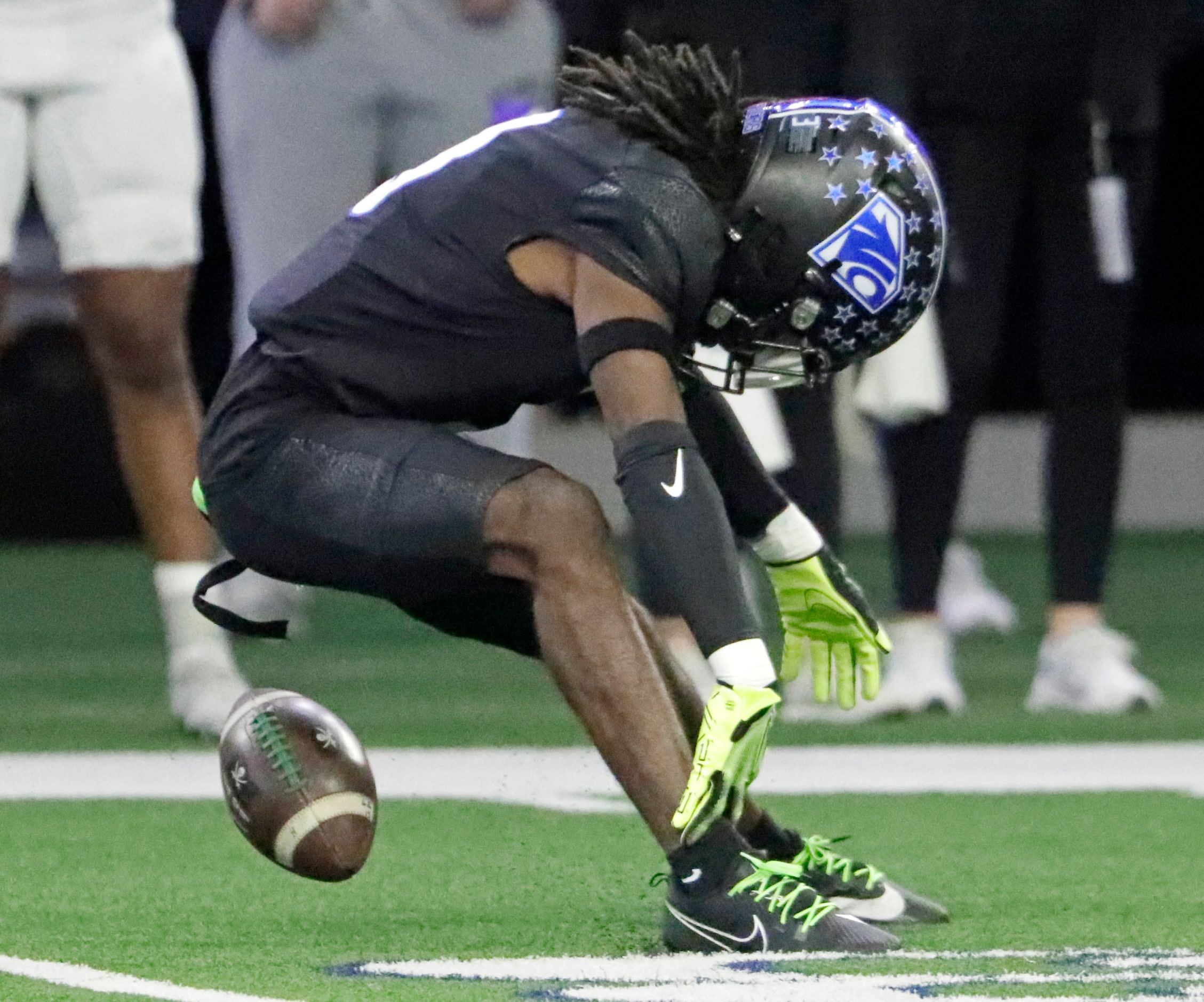 North Crowley High School wide receiver Dekoryian West-Davis (3) fumbles the opening kickoff...