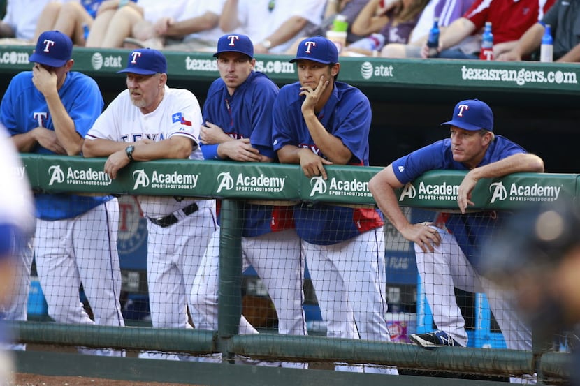 May 20, 2014; Arlington, TX, USA; Texas Rangers starting pitcher Nick Tepesch (L) and...