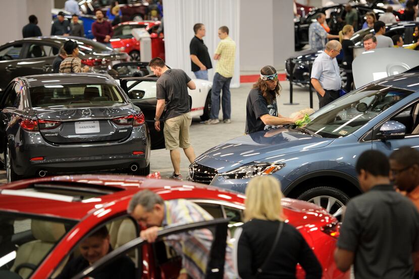 The Dallas Auto Show brought car admirers and buyers alike during the Dallas Auto Show at...