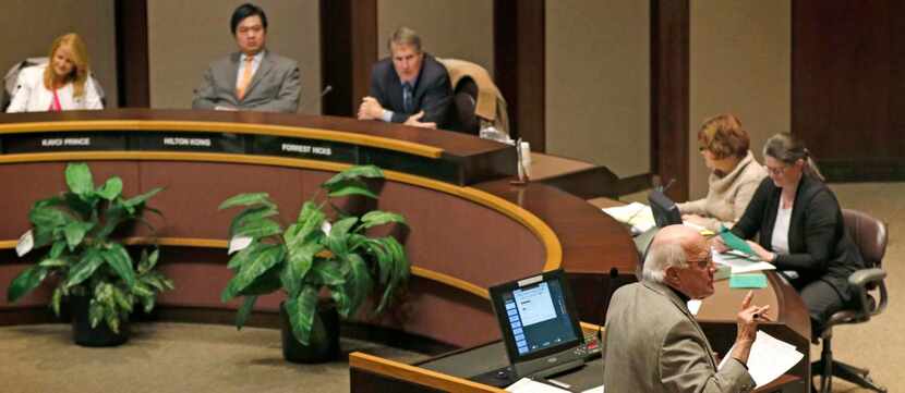 
Paul Guta, a resident of Plano, turns to speak to residents while expressing his opposition...