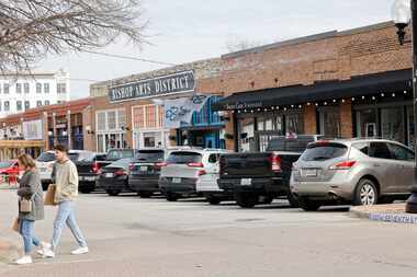 Cars parked in front of stores in Bishop Arts on Saturday, Feb. 17, 2024, in Dallas.