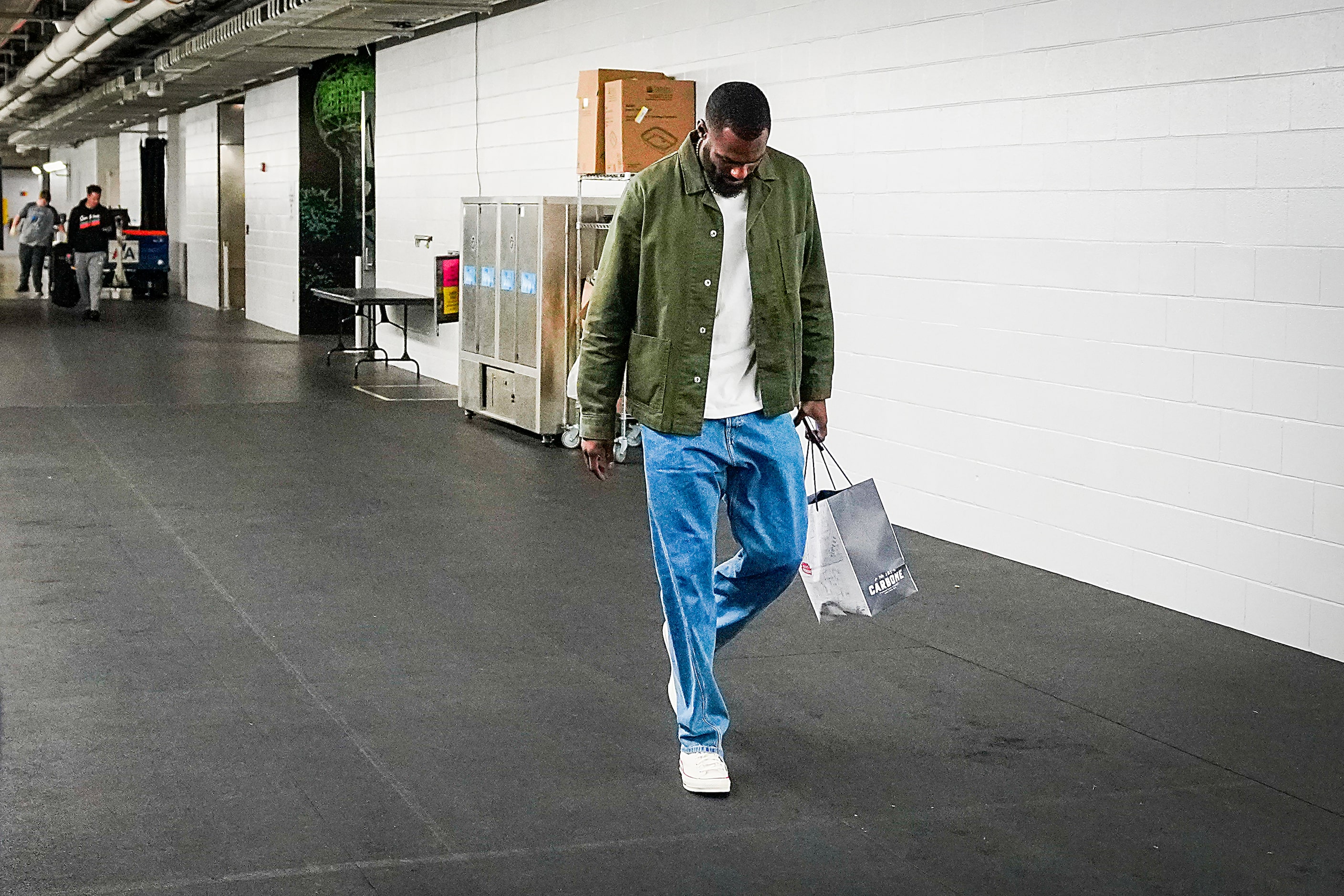 Dallas Mavericks forward Tim Hardaway Jr. leaves the interview room after a season-ending...