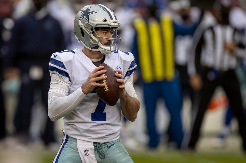 Cowboys quarterback Ben DiNucci looks to pass against the Washington Football Team during...