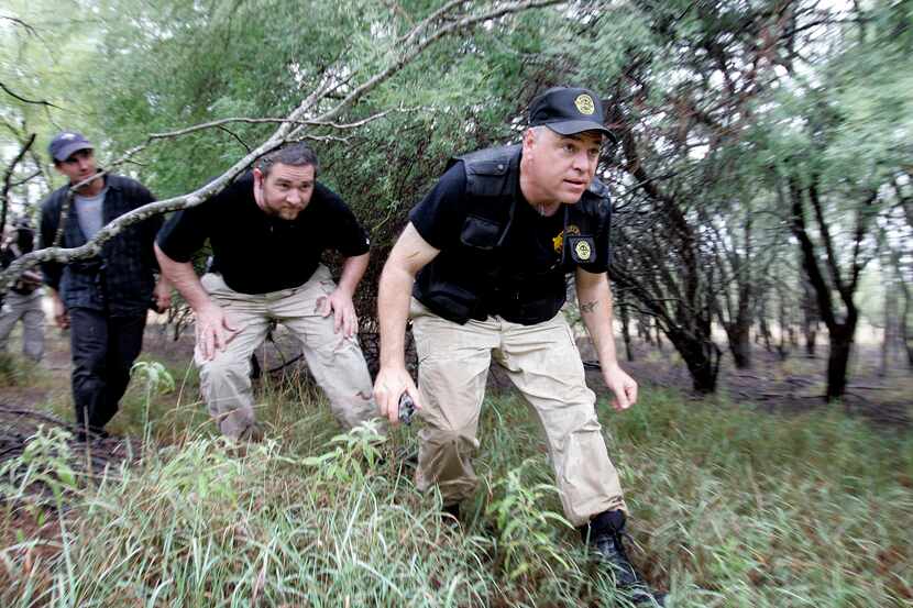 ORG XMIT: *S0417823421* U.S. Border Watch president Curtis Collier, right, Lance Williams,...