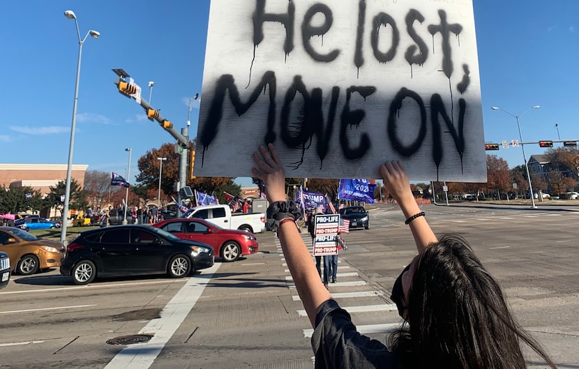 Alex Killoran offered a counter-argument to participants in a Dec. 12 pro-Trump rally in Plano.