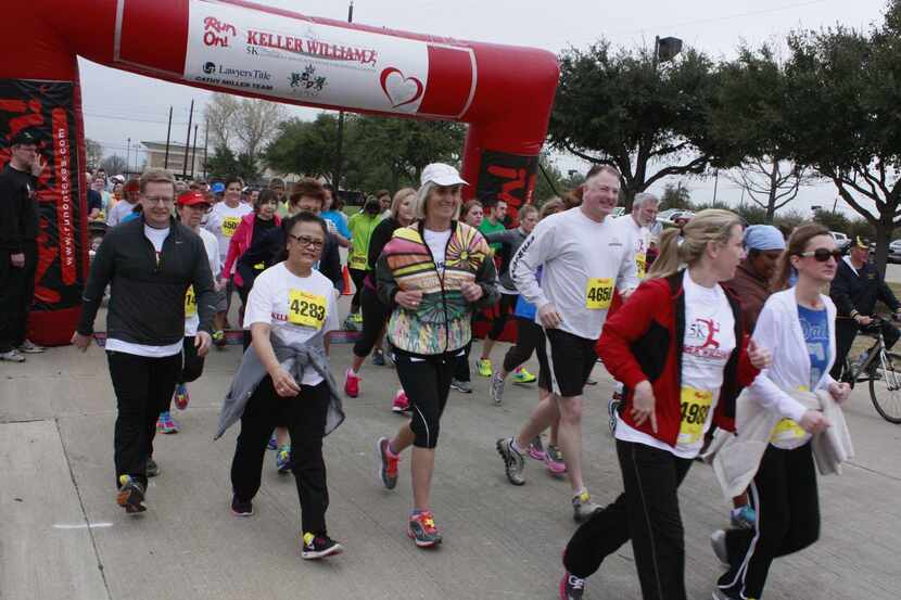 Runners  participate in last year’s Keller Williams 5K in Flower Mound to raise money for...