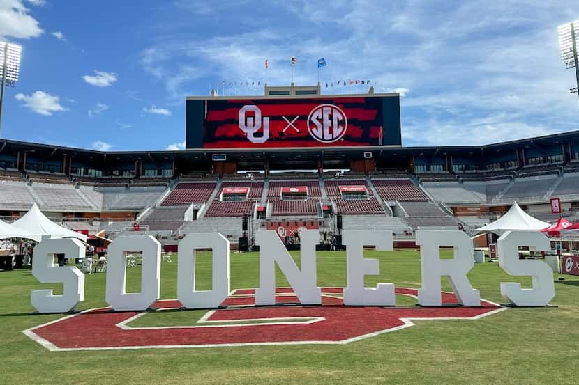 "SOONERS" stands on the football field at Oklahoma during an event kicking off the school's...