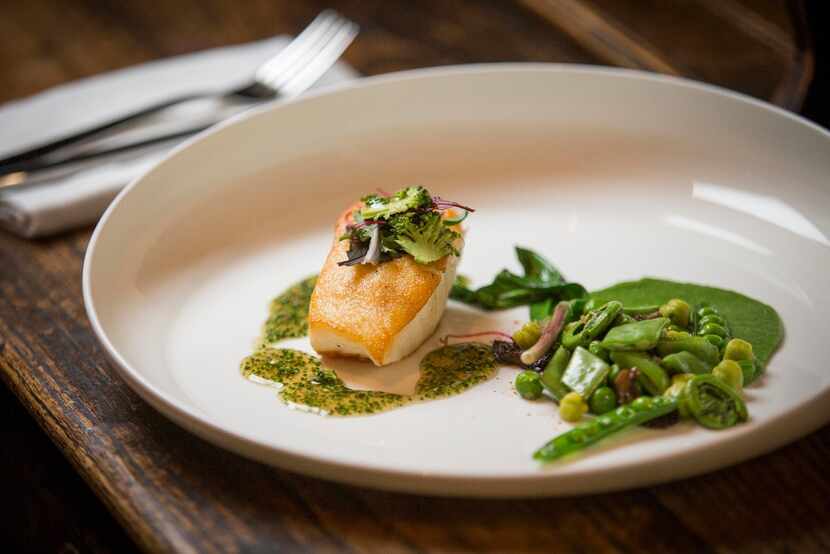 The Mansion Restaurant's executive chef Tom Parlo pairs Chilean sea bass on herb-flecked...