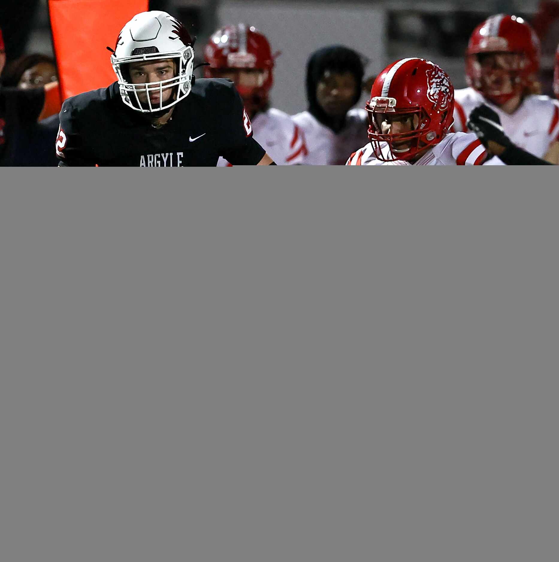 Argyle running back Dax Horany (22) looks for running room against Terrell linebacker Jared...