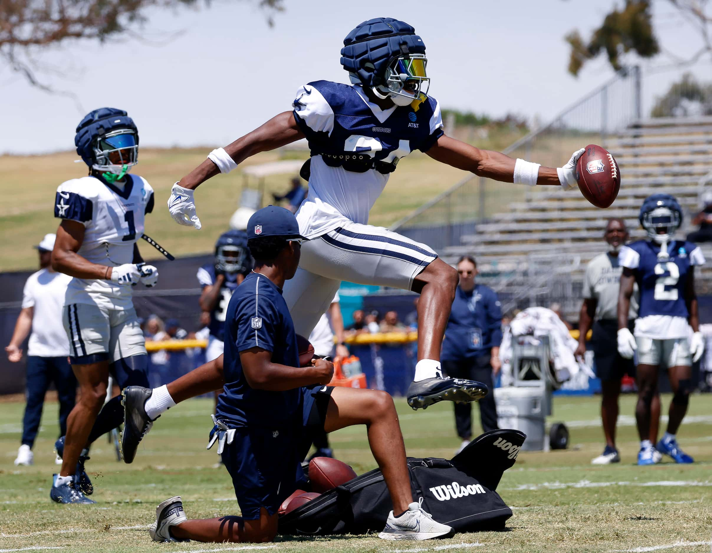 Dallas Cowboys safety Israel Mukuamu (24)  returns an interception after he undercut wide...