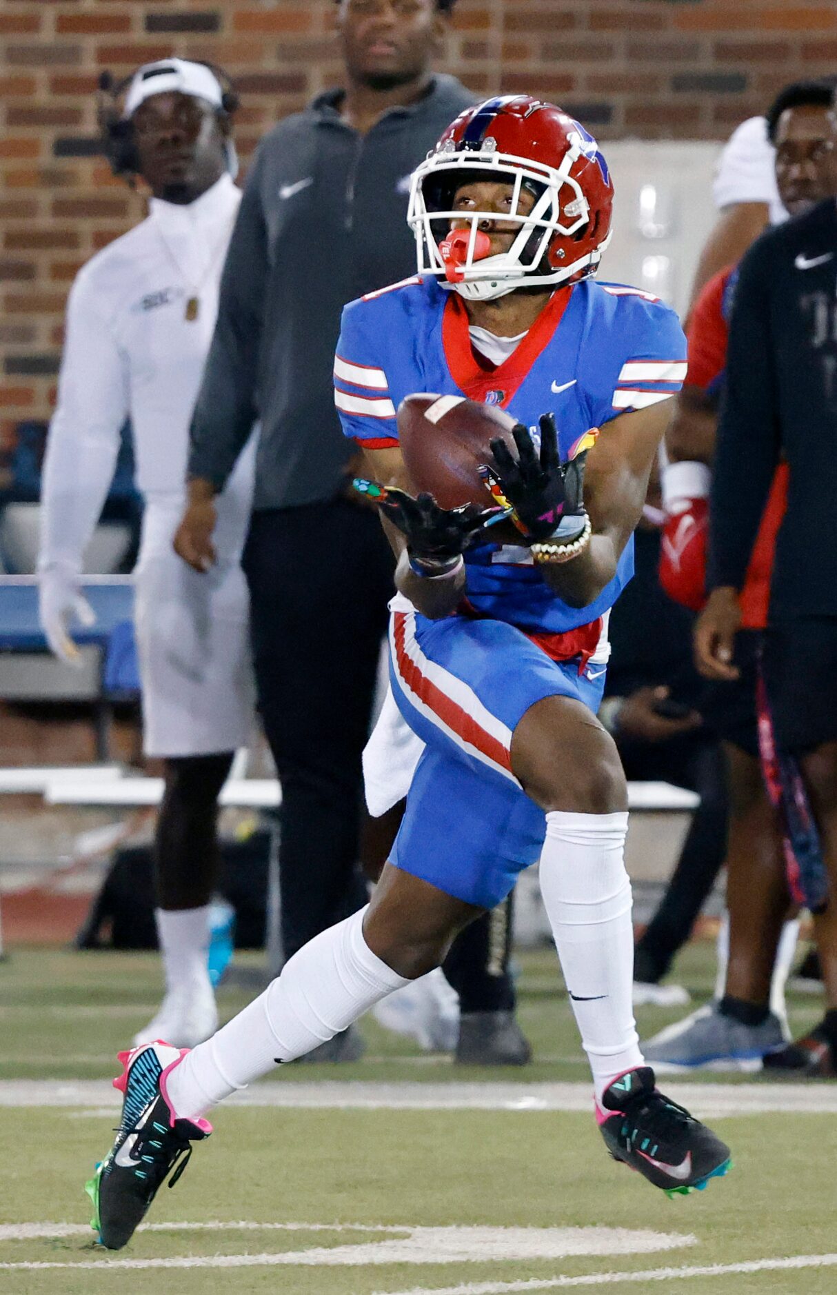 Duncanville wide receiver Dakorien Moore (1) hauls in a long touchdown catch against South...