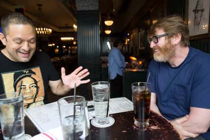 Author Chuck Klosterman (right) talks with Staff Writer  Chris Vognar at Flatiron Hall in...