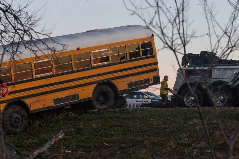 A school bus from Bishop Dunne Catholic School overturned in the westbound lanes of I-30...