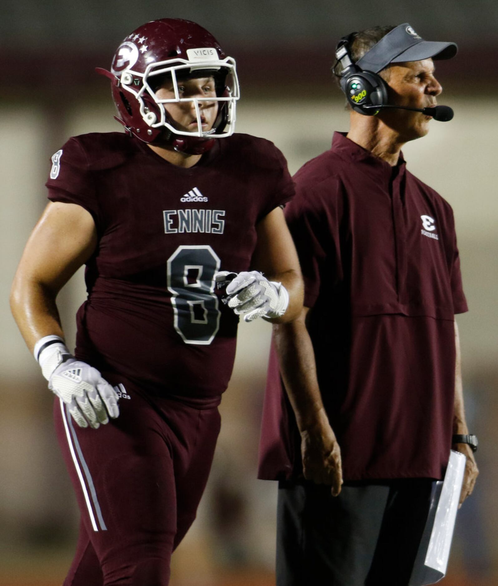 Ennis head coach Sam Harrell disagrees with the call of a game official as defensive lineman...