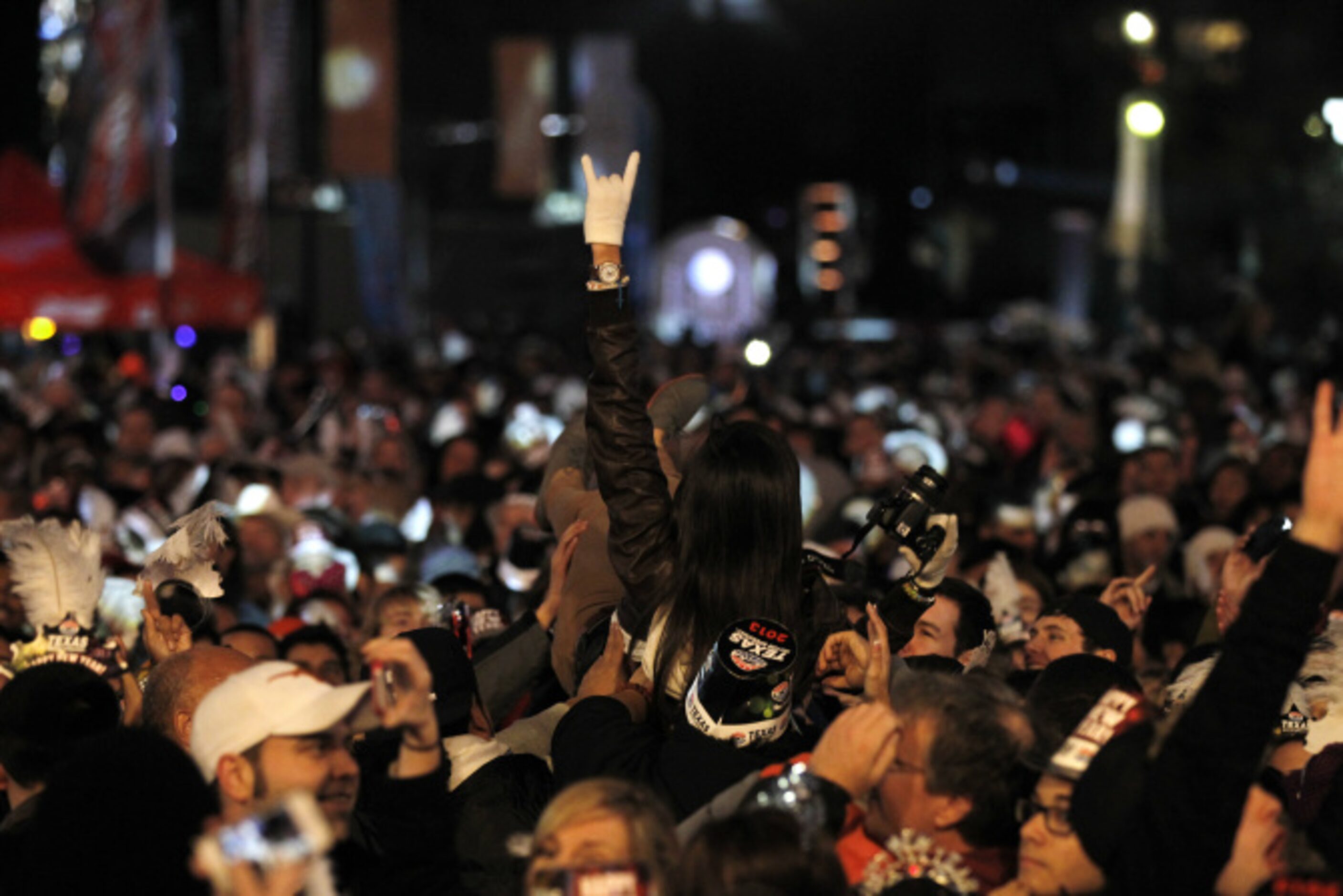 Crowd surfing at Big D New Years Eve celebration at American Airlines Center in Dallas...