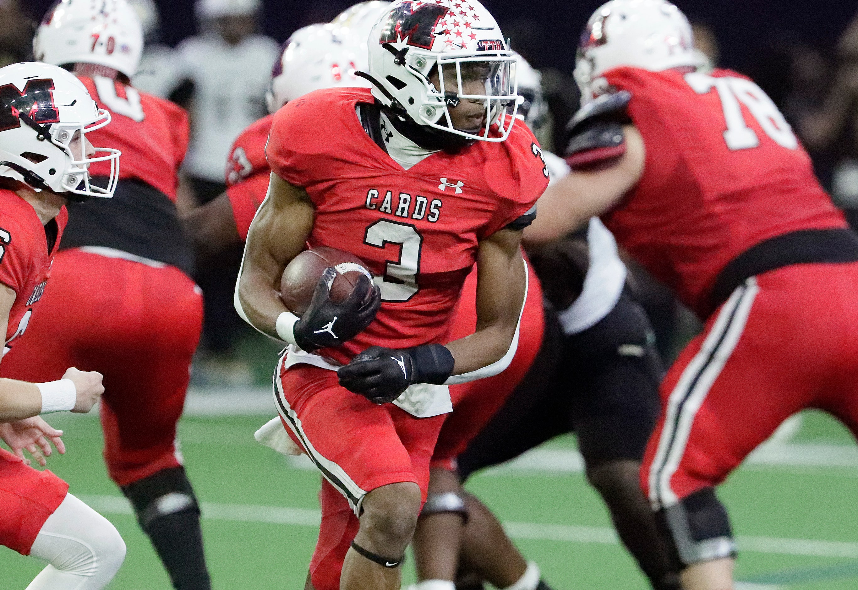 Melissa High School running back Nathan Adejokun (3) runs the football during the first half...