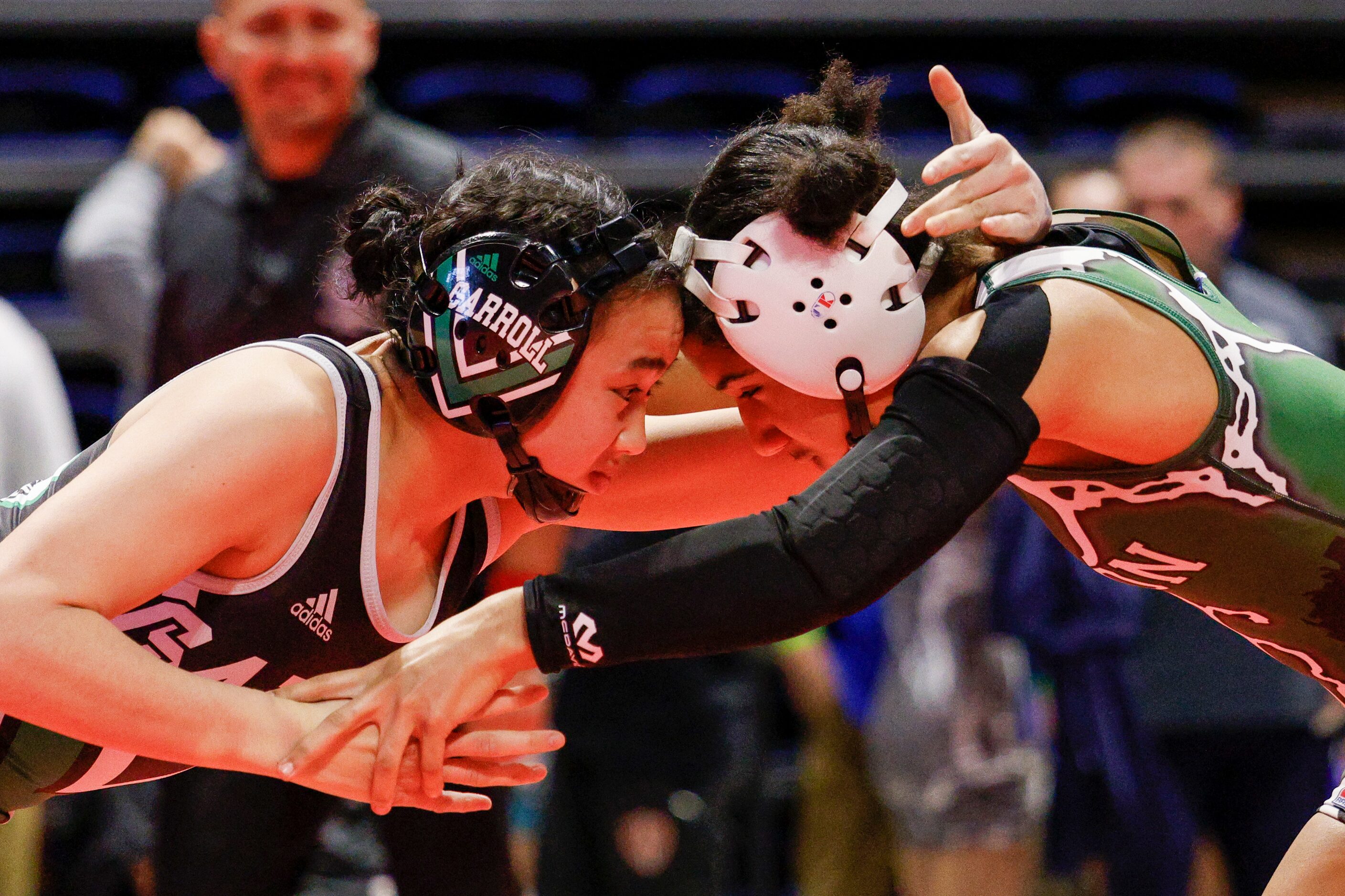 Bayley Trang of Southlake Carroll (left) wrestles Alexis Hanks of Killeen Ellison during a...