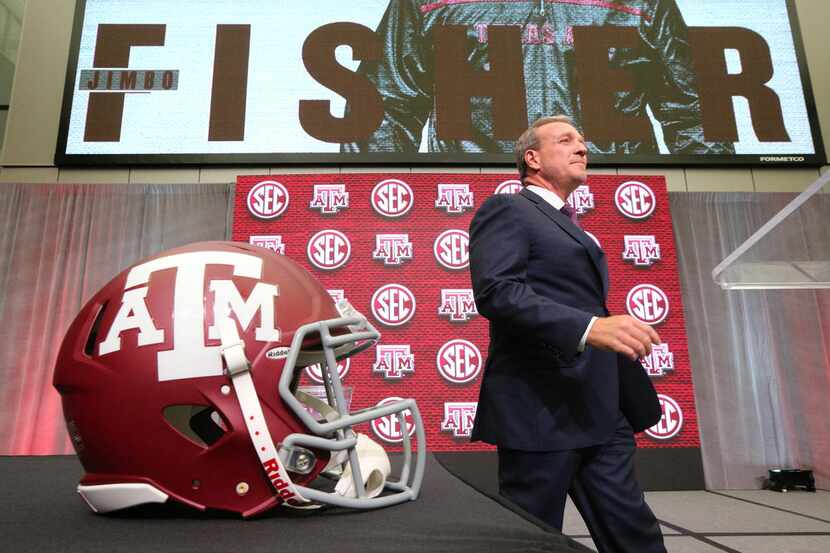 Texas A&M head coach Jimbo Fisher arrives for his SEC Media Days press conference at the...