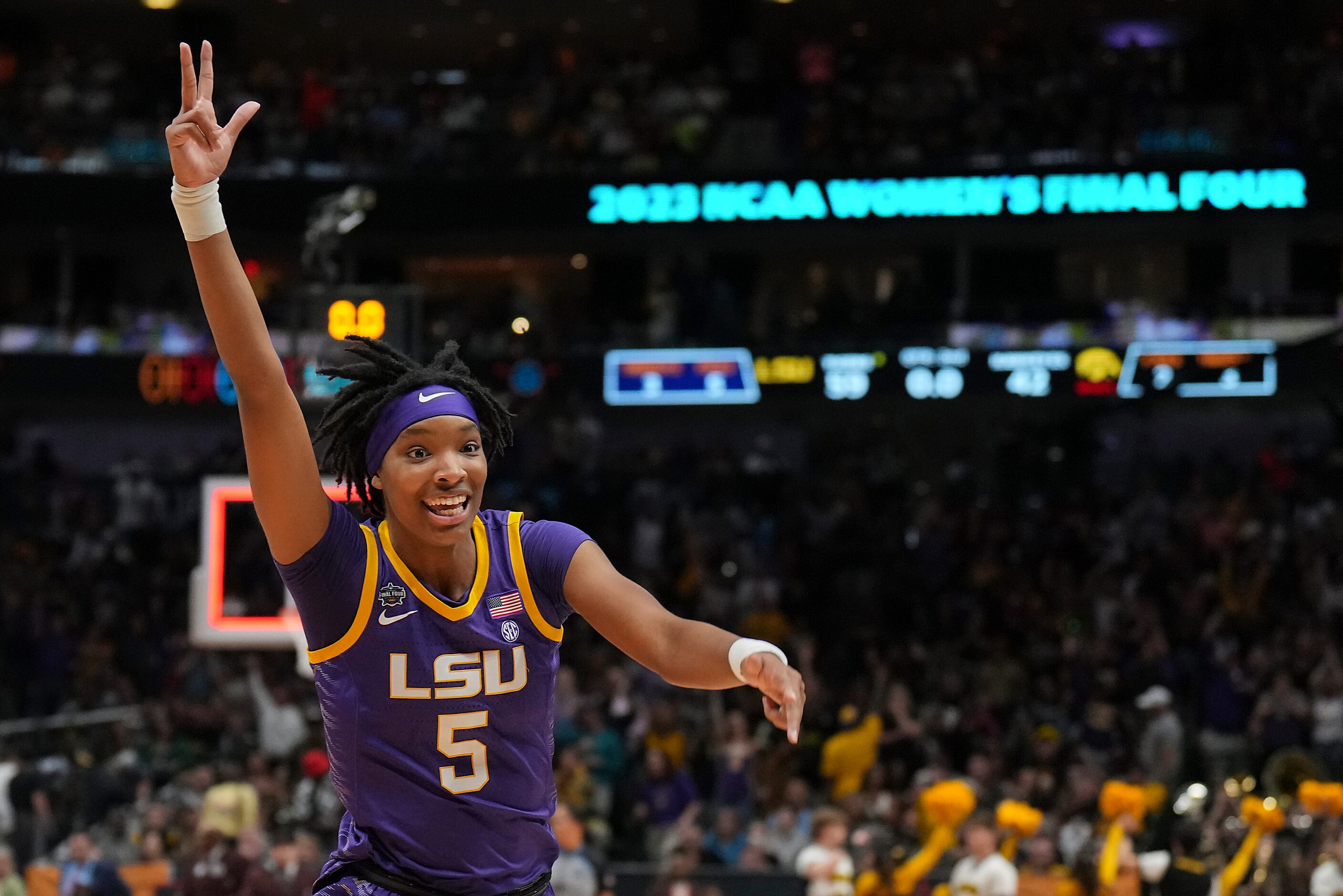 LSU forward Sa'Myah Smith (5) celebrates while leaving the floor end the first half of the...