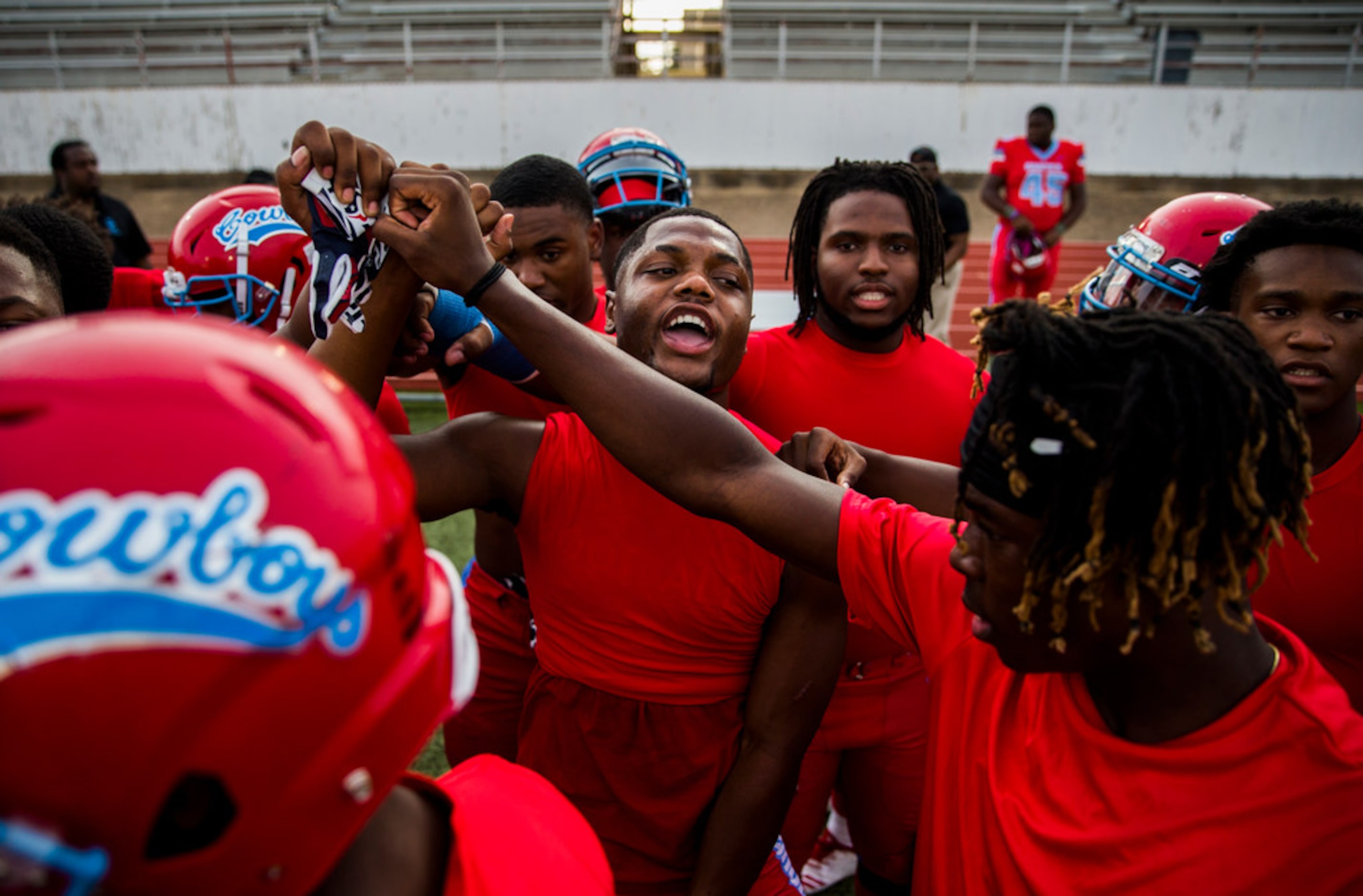 Carter running back Jamalrian Jones (23) leads a chant before a 4A high school football game...