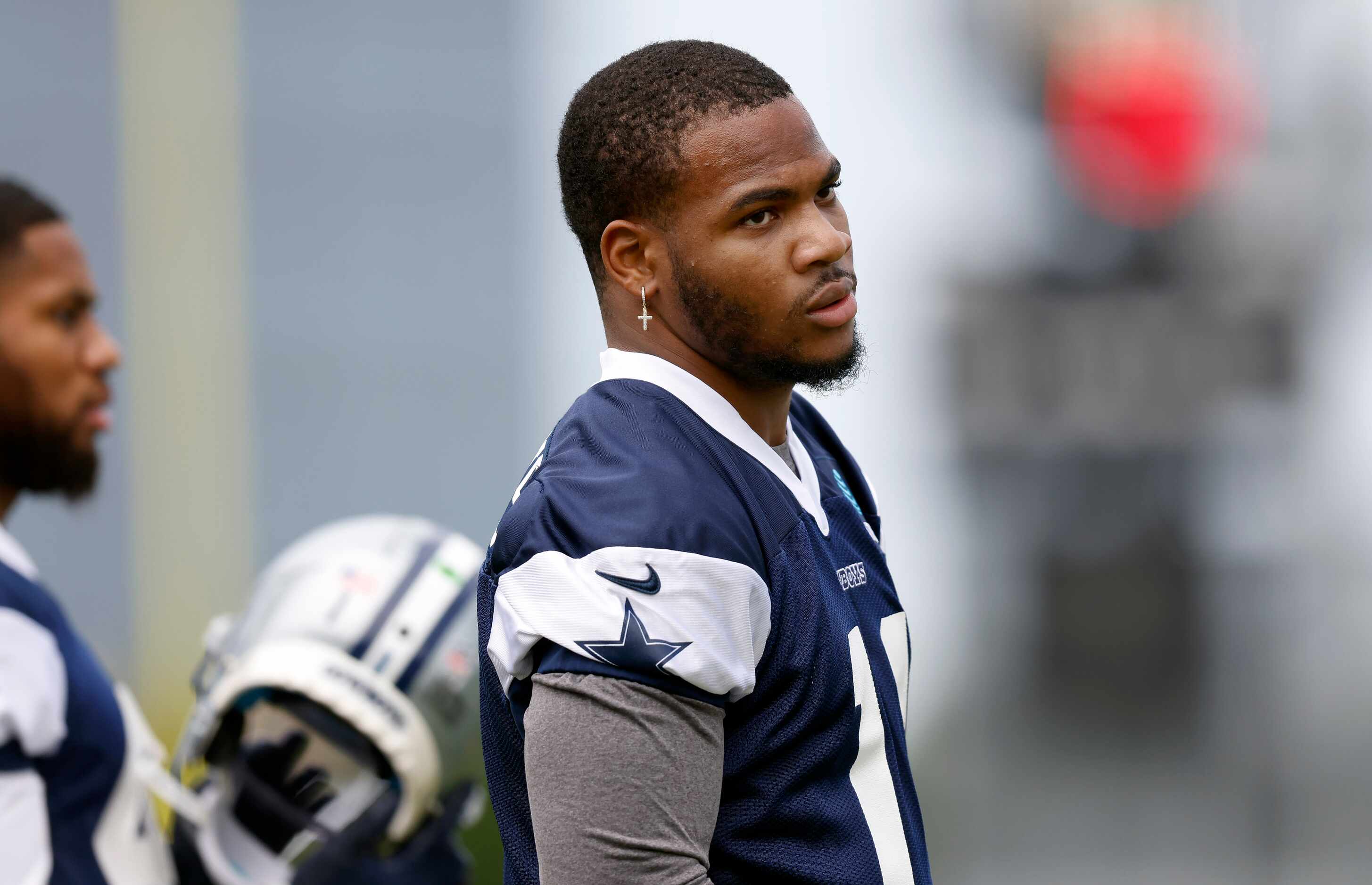 Dallas Cowboys rookie linebacker Micah Parsons (11) takes a breather during rookie minicamp...
