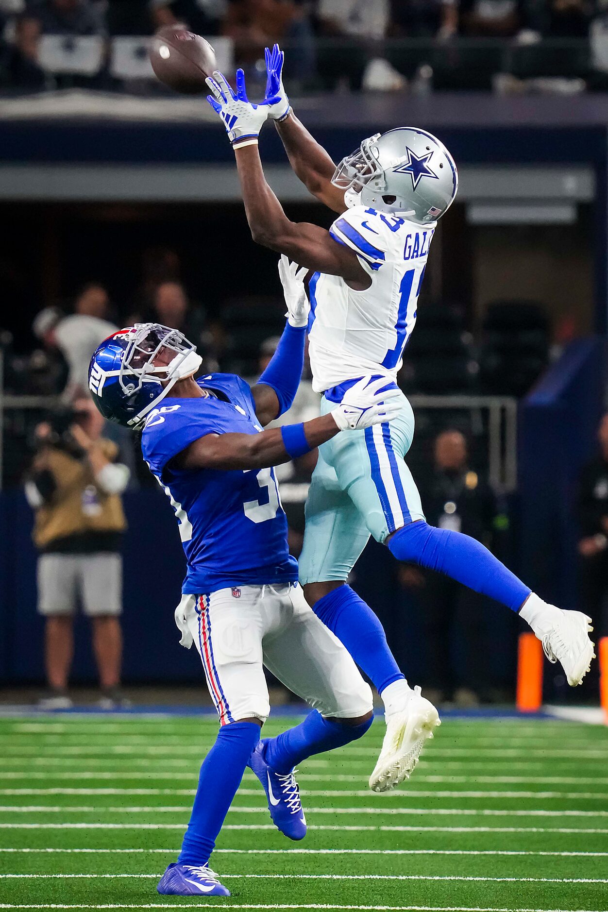 Dallas Cowboys wide receiver Michael Gallup (13) catches a 29-yard pass over New York Giants...