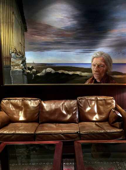 Artwork adorns the walls of the windowless bar at Hotel Holt, Reykjavík