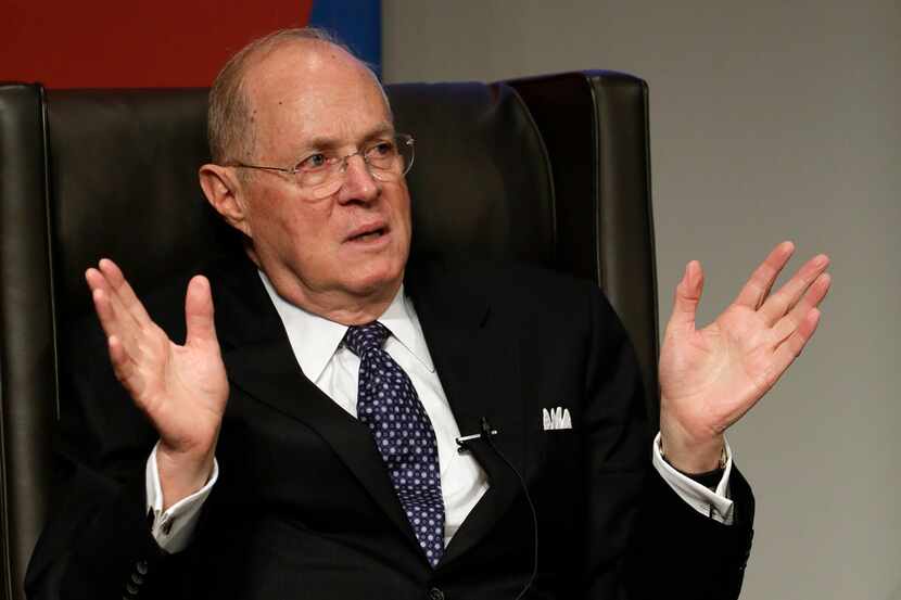 Supreme Court Justice Anthony Kennedy speaks to faculty members at the University of...