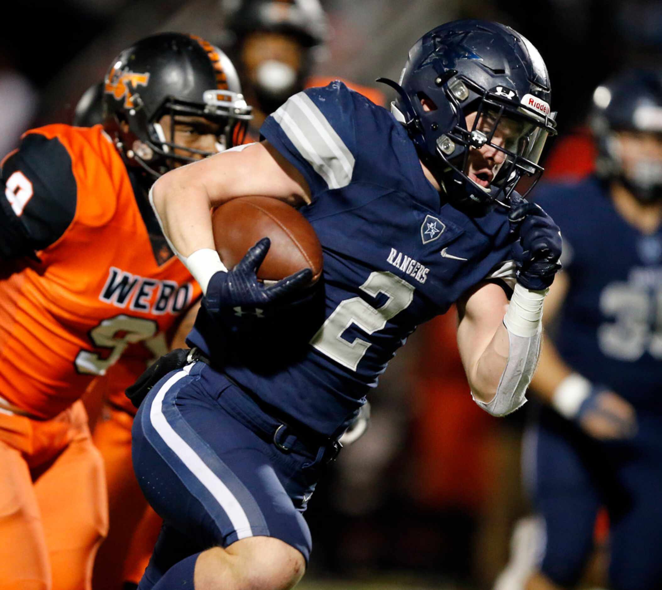 Frisco Lone Star (2) races for a fourth quarter touchdown against Lancaster during their...