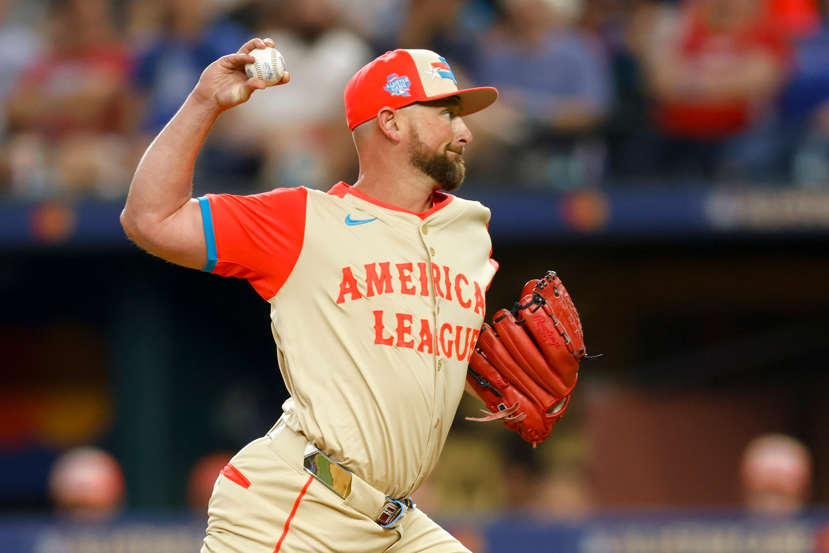 American League's Kirby Yates, of the Texas Rangers, delivers a pitch during the eighth...