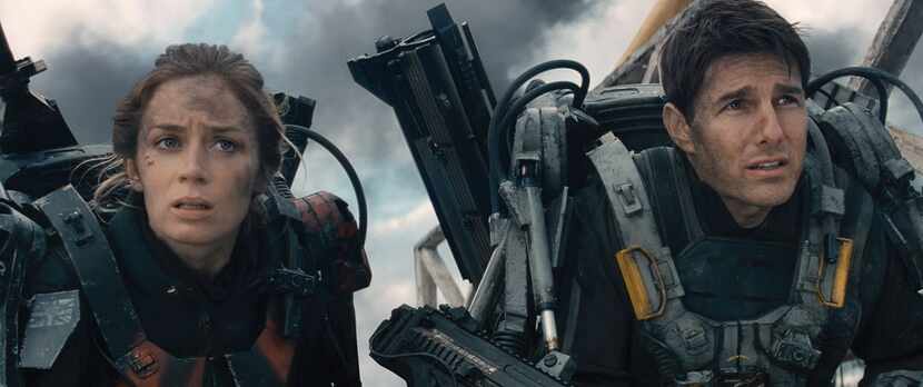 Emily Blunt, left, as Rita and Tom Cruise as Cage in "Edge of Tomorrow."
