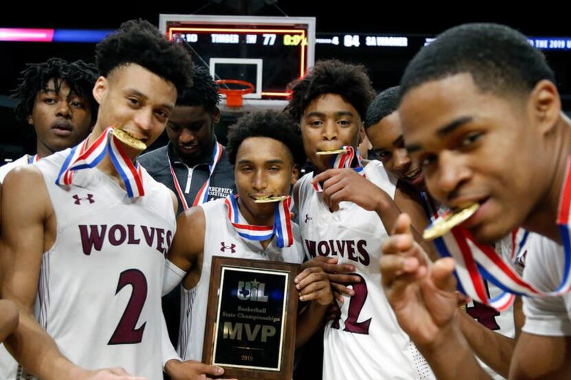 Players at the UIL boys basketball 5A state final between Mansfield Timberview vs. San...