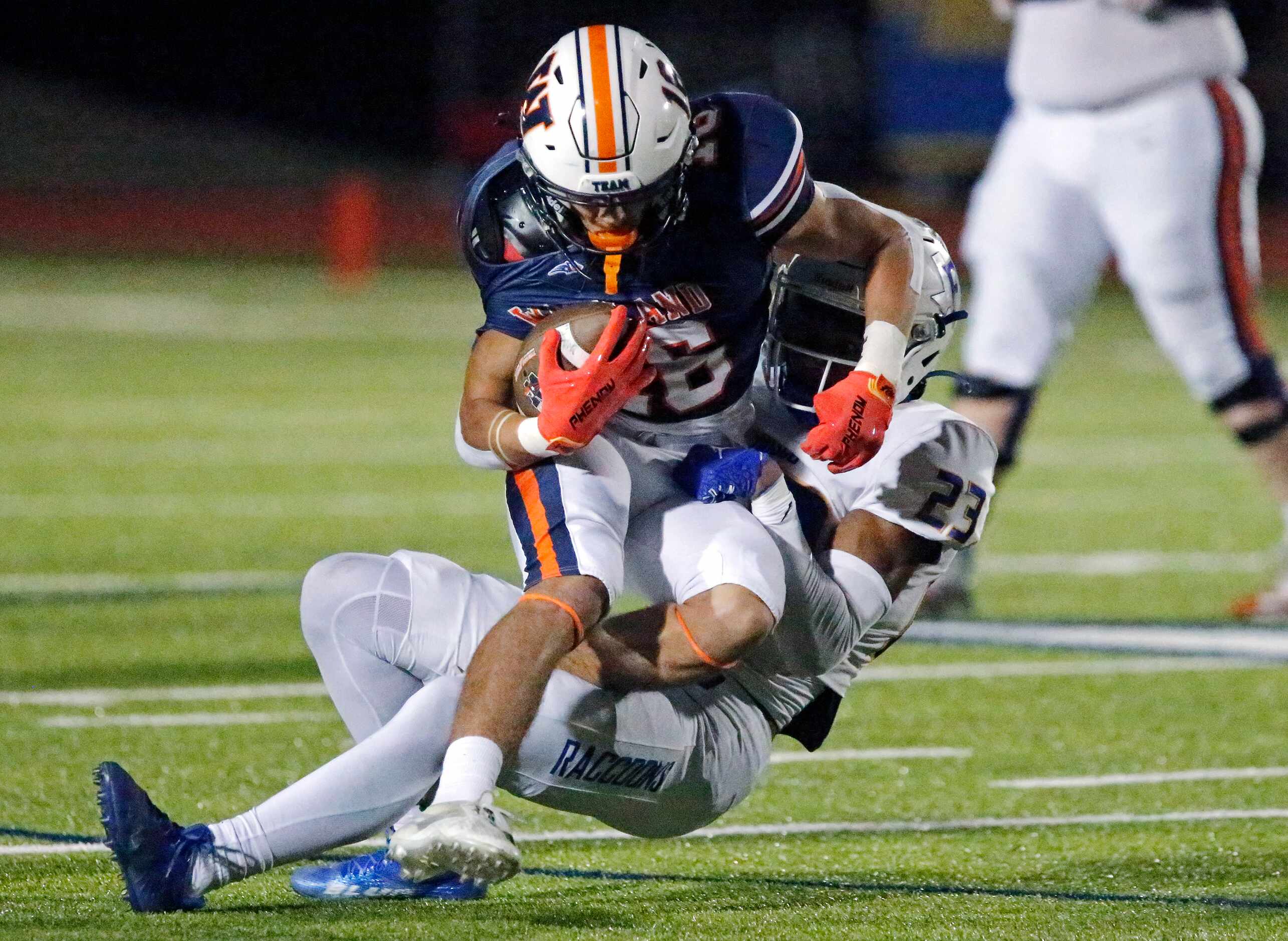 Wakeland High School wide receiver Hayden O'neal (16) is tackled after the catch by Frisco...