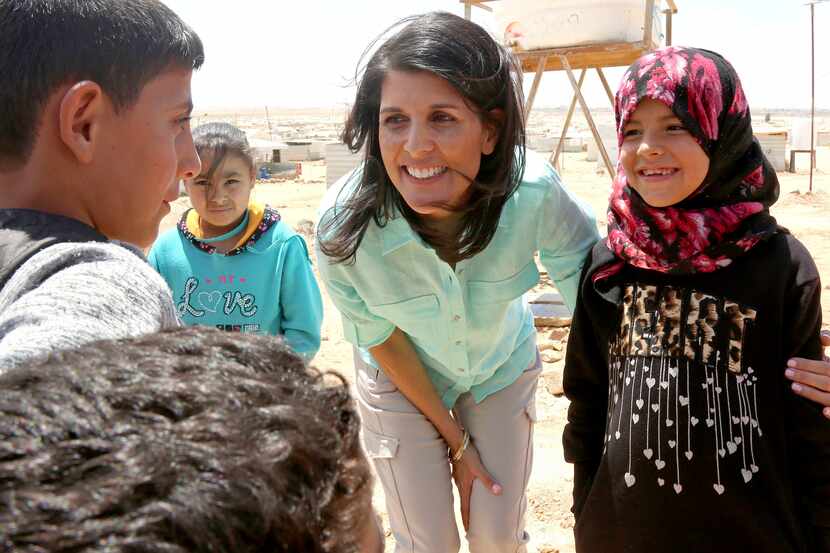 U.S. Ambassador to the United Nations Nikki Haley, speaks with Syrian refugee children,...